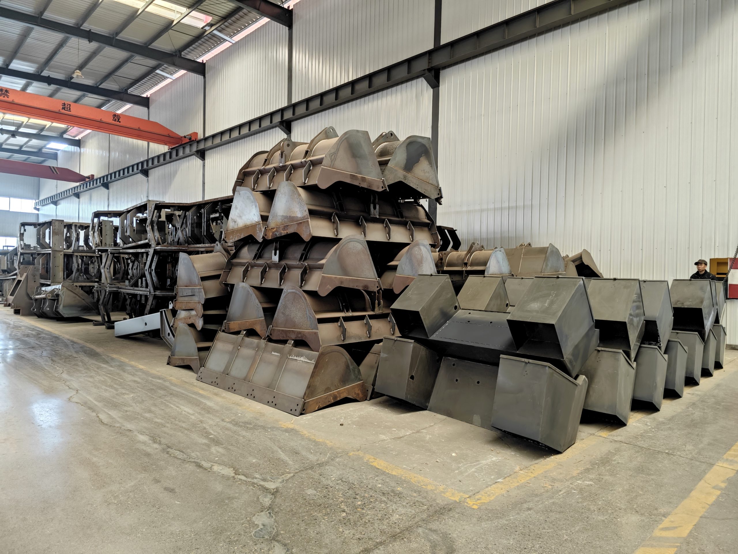 About Us-EN Wheel loader buckets waiting for the assembly